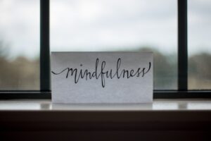 A paper with the word "mindfulness" written on it.