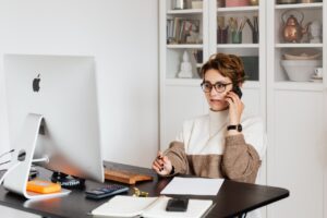 Woman talking on the phone.