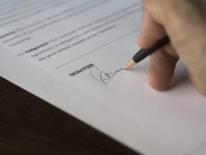 person signing an agreement