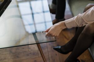 a person putting a ring on a table