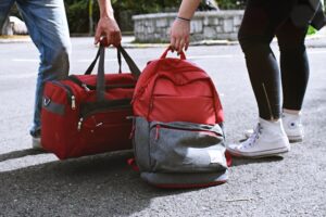 people carrying bags