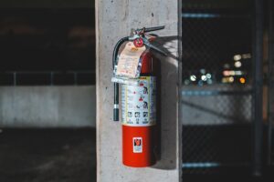 Mounted fire extinguisher on a post 