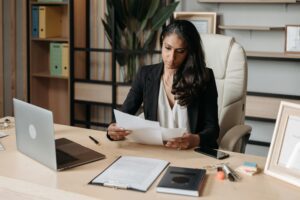 a woman reading and considering federal vs. state drug laws